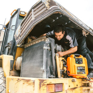 Daniel conducting an onsite emergency repair on a heavy duty vehicle