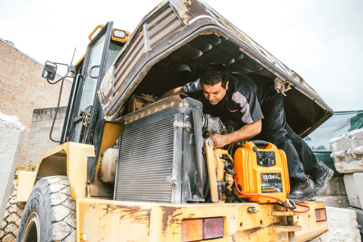 Daniel conducting an onsite emergency repair on a heavy duty vehicle