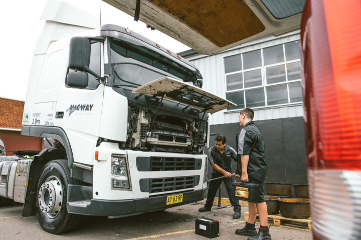 Daniel and Harisson doing servicing of a truck that is part of the Micway fleet serviced by Daniels Automotive