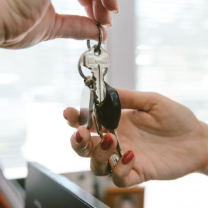 Woman leaving her keys at Daniels Automotive for after hours pickup