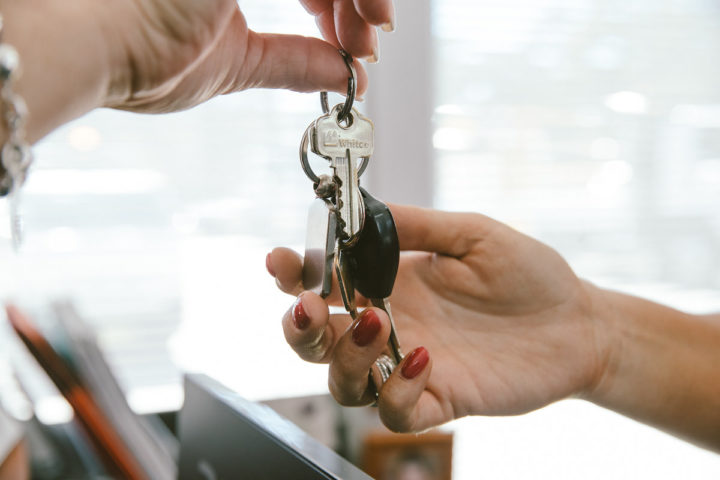 Woman leaving her keys at Daniels Automotive for after hours pickup